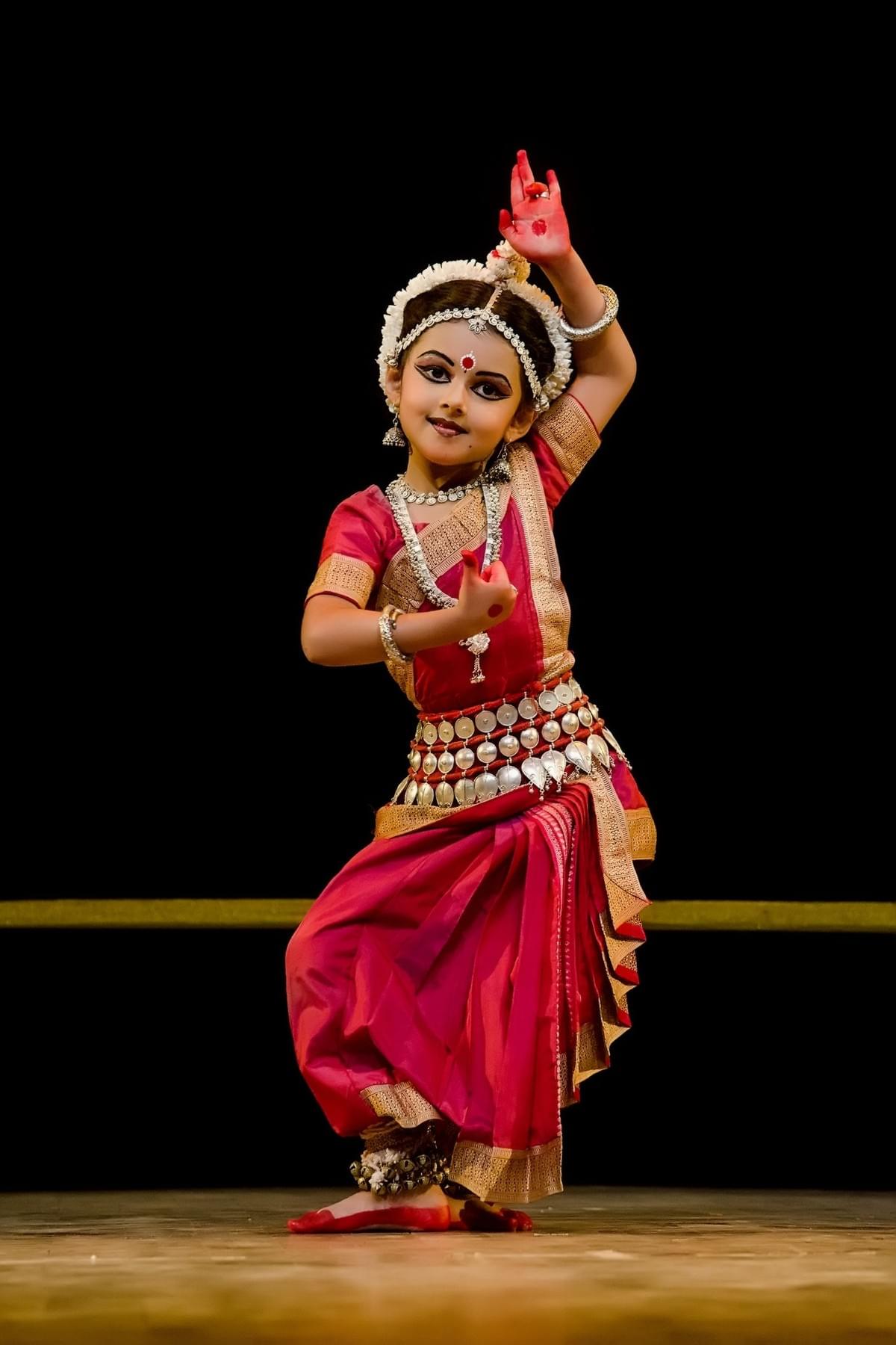 A girl performing Kathak. A girl performing Kathak.