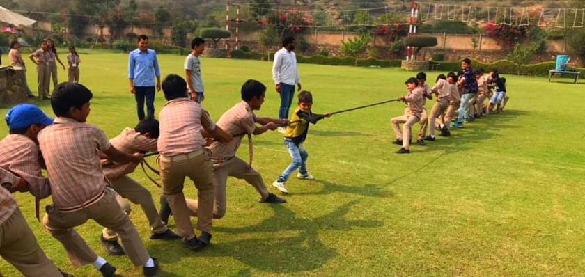 Children enjoying at a school picnic. Children enjoying at a school picnic.