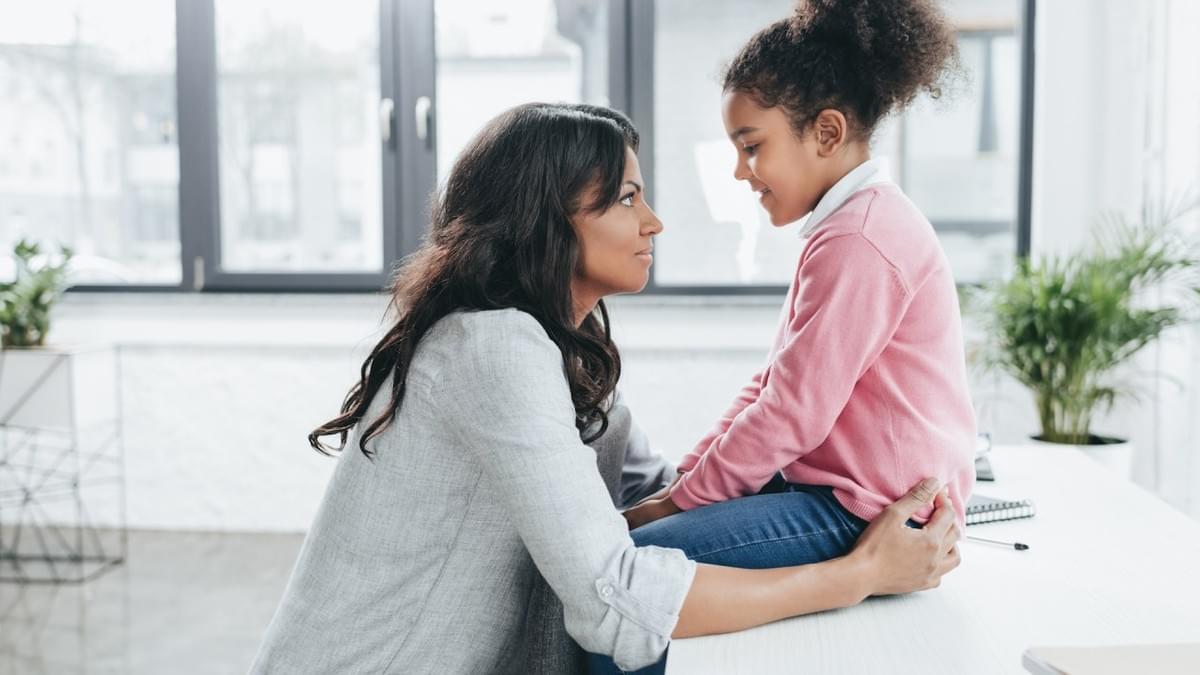 Mother talking to her daughter Mother talking to her daughter