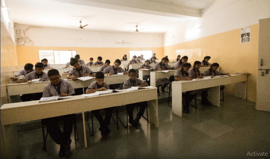 Students at Shivneri Boarding School studying in a classroom Students at Shivneri Boarding School studying in a classroom