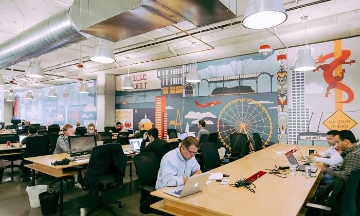 Image of startup founders and entrepreneurs at a WeWork space in Hong Kong. Image of startup founders and entrepreneurs at a WeWork space in Hong Kong.