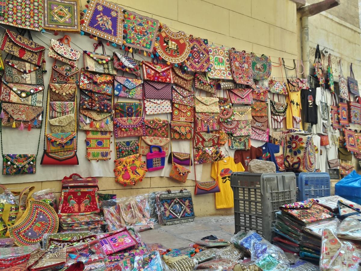 Shopping in Front of Patwa Haveli. Padharo Mhare Des JODHPUR-JAISALMER. Shopping in Front of Patwa Haveli. Padharo Mhare Des JODHPUR-JAISALMER.