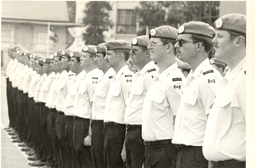 Reviewer stands at attention during parade of Canadian Contingent United Nations Emergency Force Middle East, Ismailia, Egypt, 1978 (3rd from R) Reviewer stands at attention during parade of Canadian Contingent United Nations Emergency Force Middle East, Ismailia, Egypt, 1978 (3rd from R)