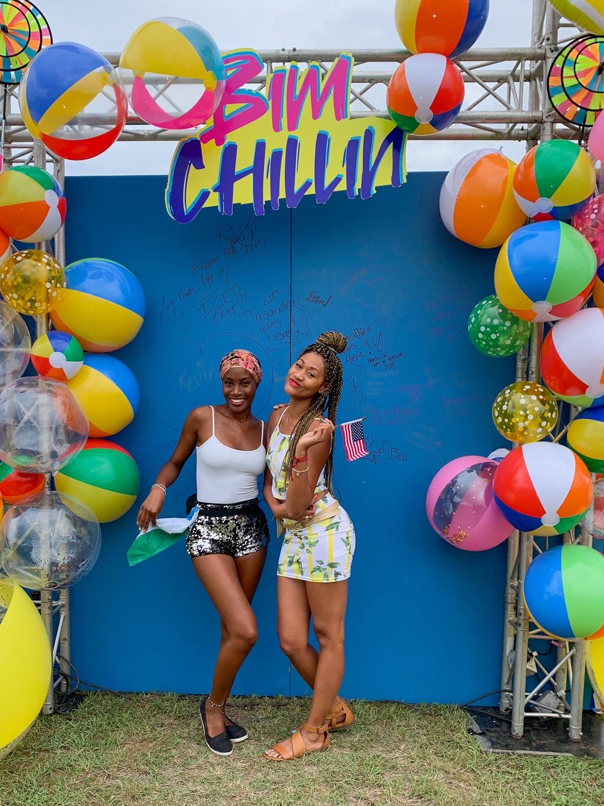 Two girls posing at the BIM Chillin Cooler fete in Barbados for Crop Over Two girls posing at the BIM Chillin Cooler fete in Barbados for Crop Over