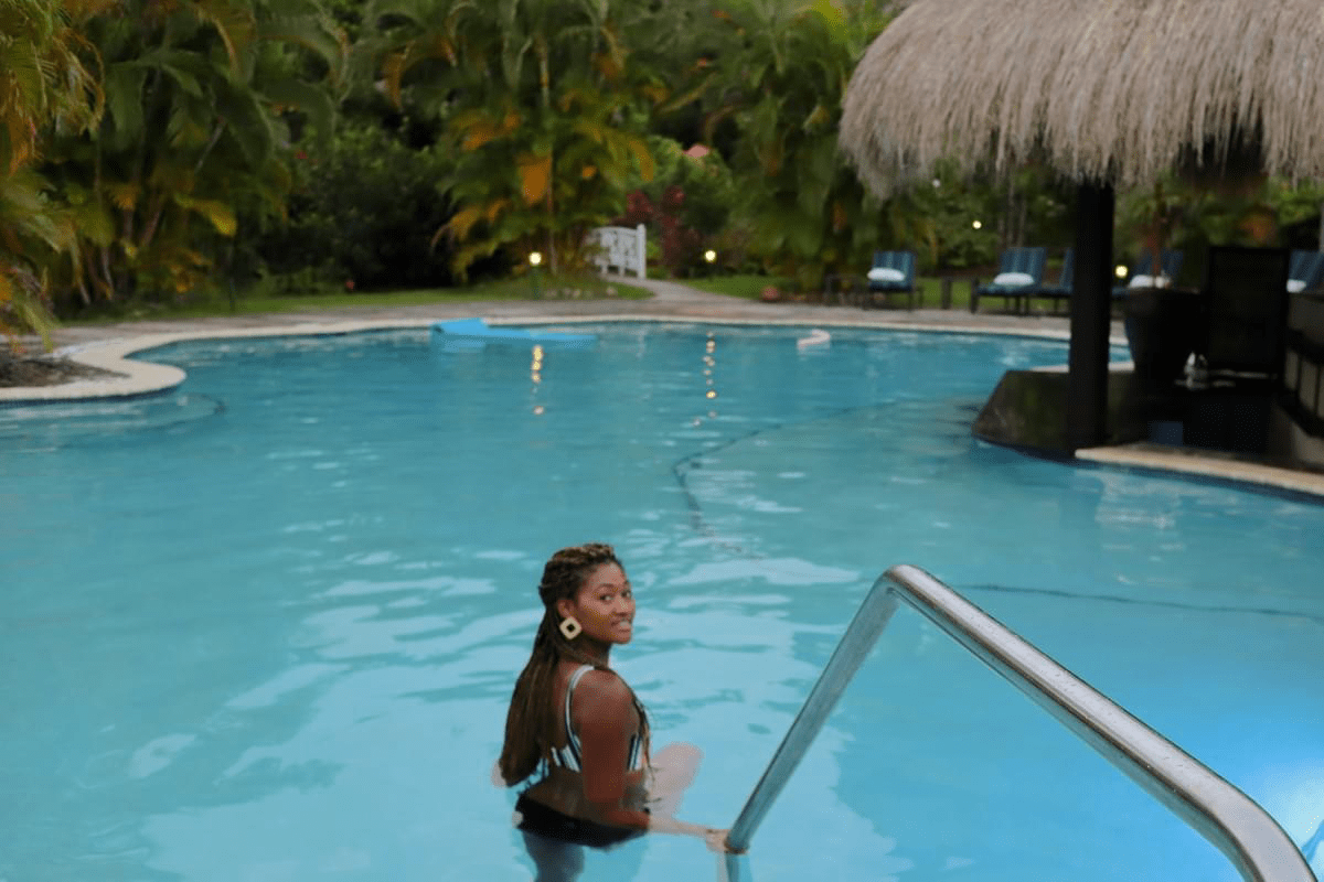 Cultures Uncovered hanging out in a pool at dusk in St Lucia at East Winds - natural protective hairstyles for swimming Cultures Uncovered hanging out in a pool at dusk in St Lucia at East Winds - natural protective hairstyles for swimming