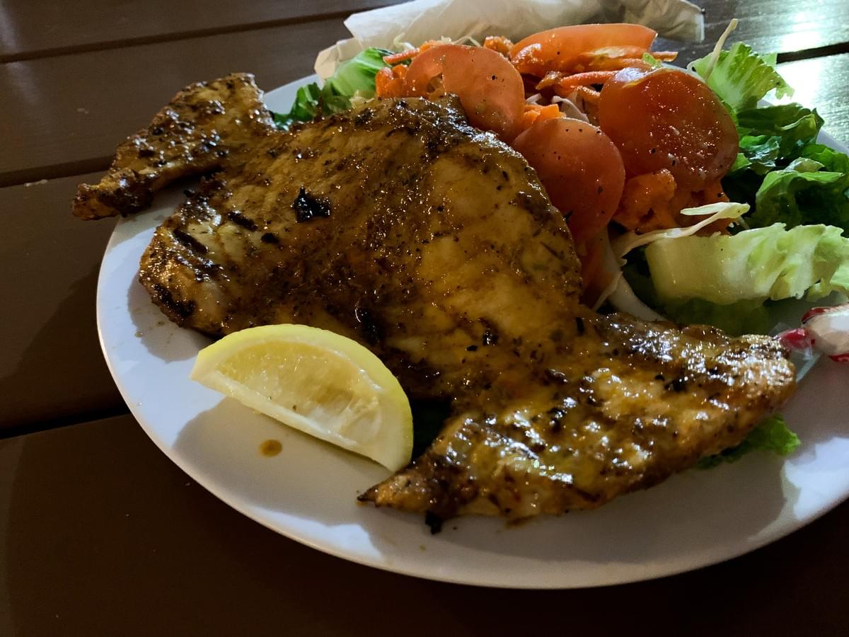 A grilled Marlin fish plate with salad from Just Grillin' in Holetown, Barbados A grilled Marlin fish plate with salad from Just Grillin' in Holetown, Barbados
