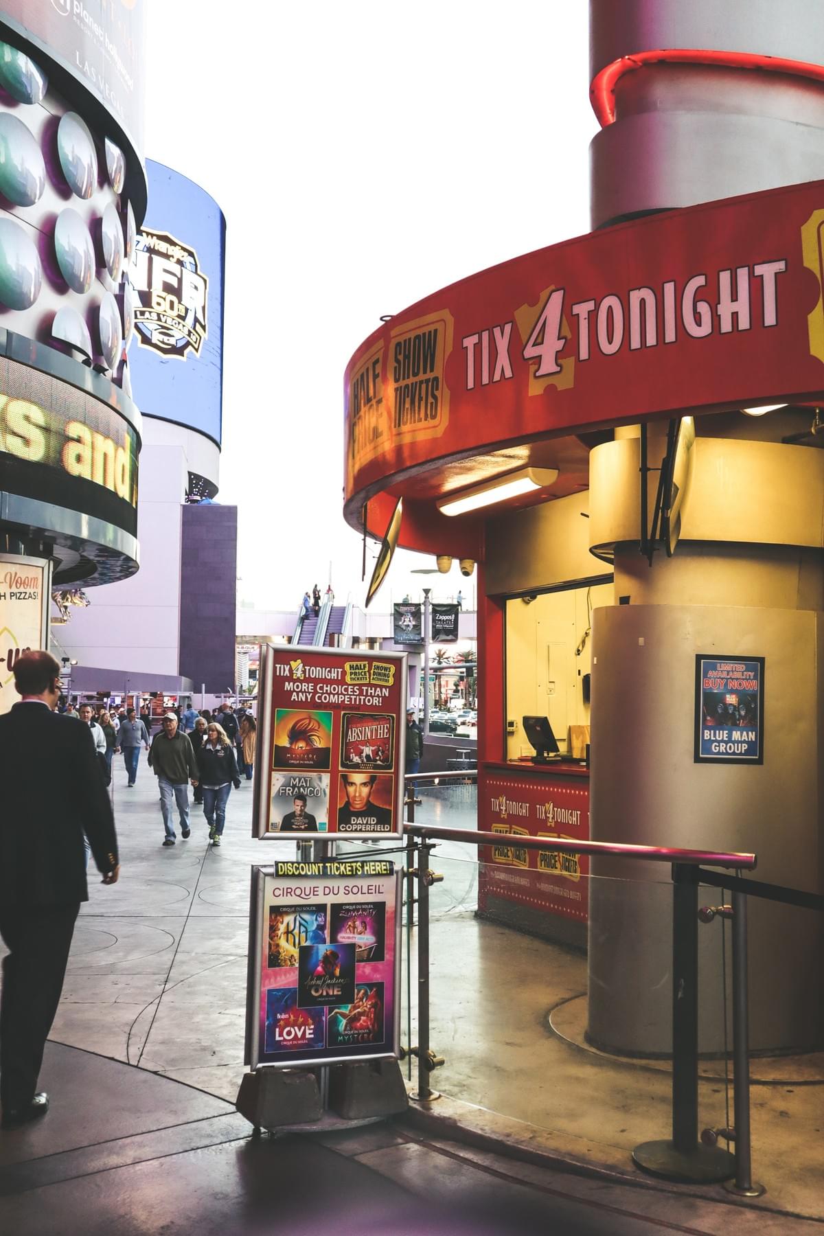 Tix4Tonight, a half-priced shows booth, on the Las Vegas strip near Planet Hollywood with posters of discounted shows tickets Tix4Tonight, a half-priced shows booth, on the Las Vegas strip near Planet Hollywood with posters of discounted shows tickets