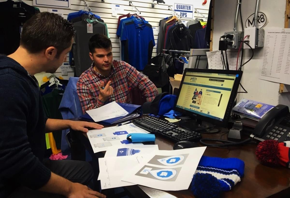 Yeti founder, Chris Barry (blue), discusses production details with Danny from College Hype Yeti founder, Chris Barry (blue), discusses production details with Danny from College Hype
