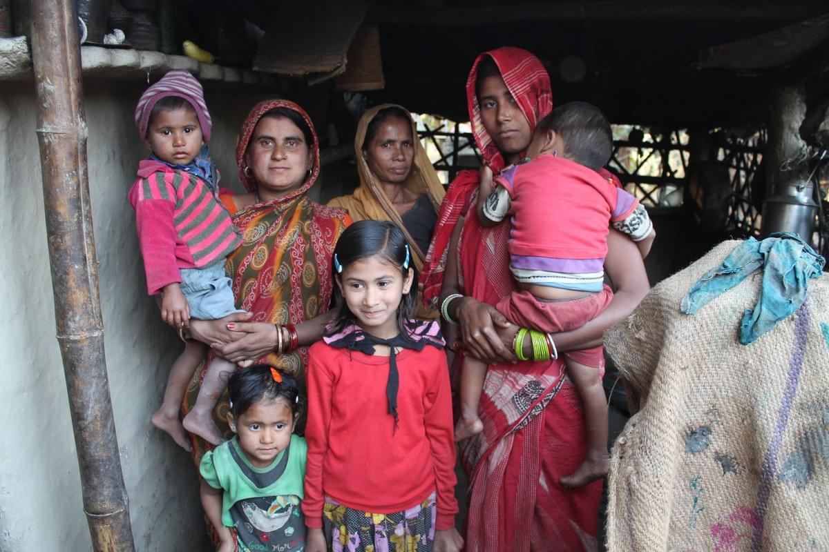 On the left, Nigah with her three surviving children On the left, Nigah with her three surviving children