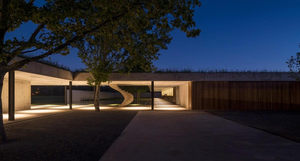 Stunning concrete stables features grassy roof for horses to graze Estudio Ramos Stunning concrete stables features grassy roof for horses to graze Estudio Ramos