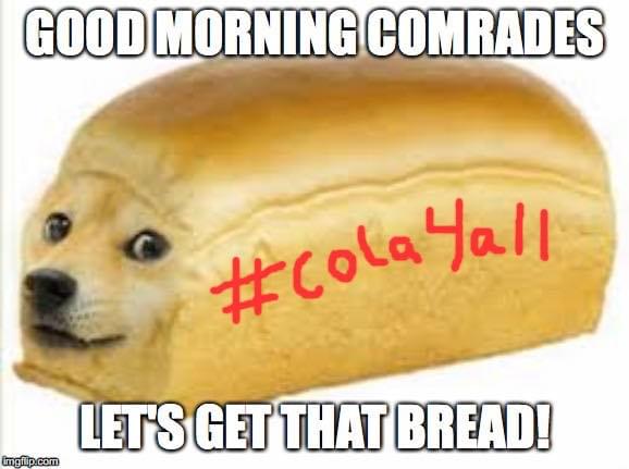 A shiba inu dog shaped like a loaf of bread with the words "#COLA4ALL" on the side. Surrounding text says, "Good morning comrades, let's get that bread!" A shiba inu dog shaped like a loaf of bread with the words "#COLA4ALL" on the side. Surrounding text says, "Good morning comrades, let's get that bread!"