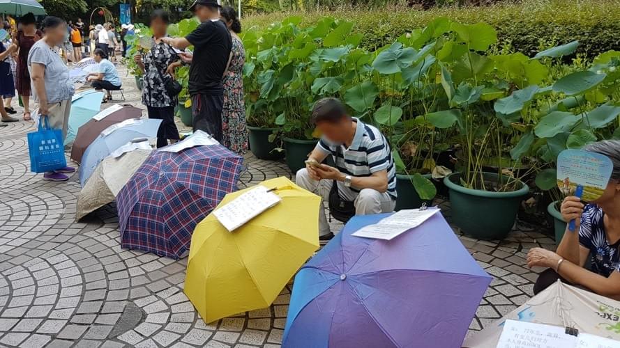 Image showing people gathered at the marriage market in Shanghai, China. Image showing people gathered at the marriage market in Shanghai, China.