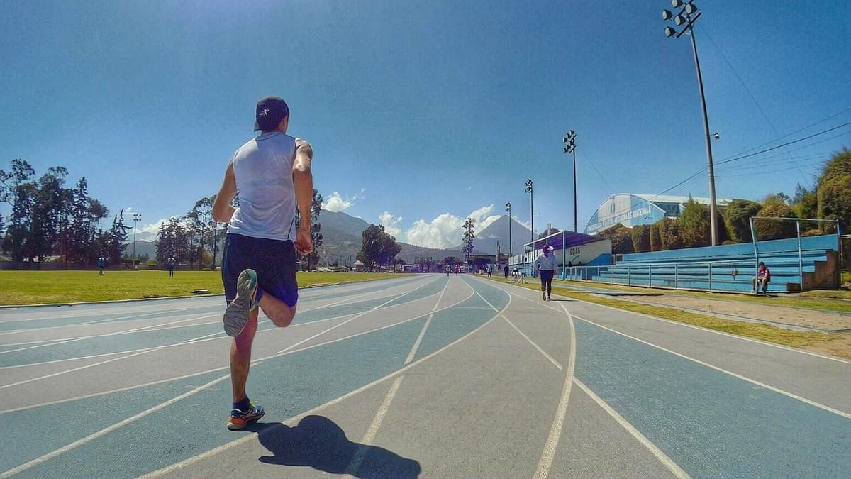 Running track session in Xela, the track is surrounded by volcanoes Running track session in Xela, the track is surrounded by volcanoes
