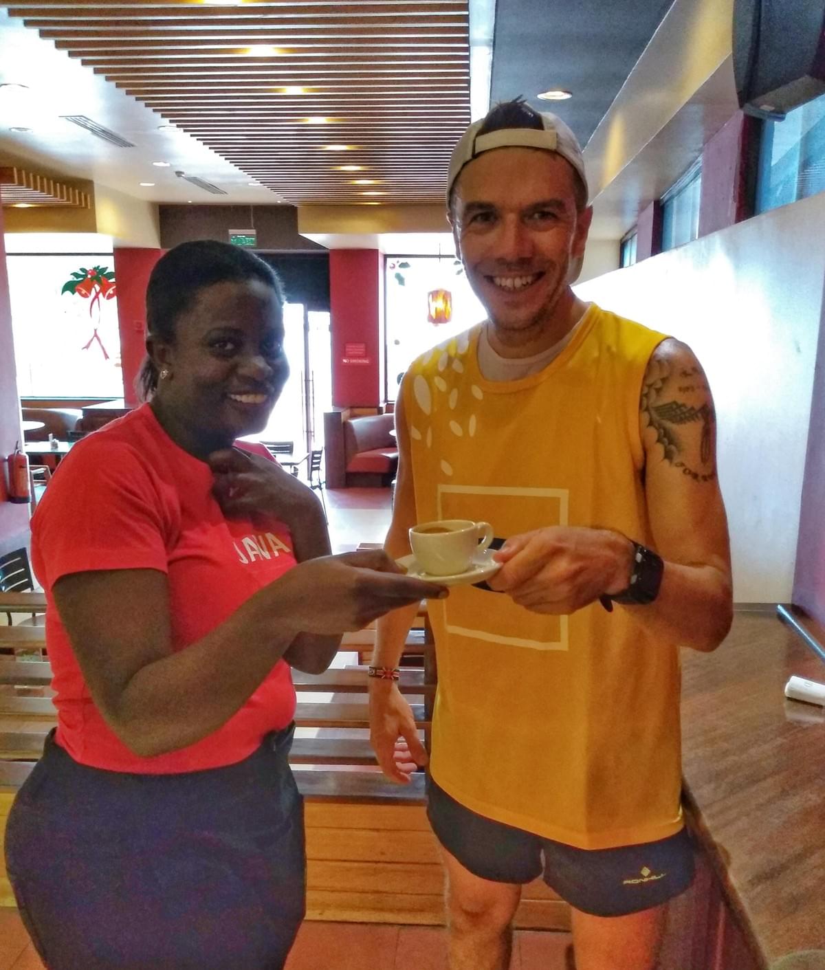 an MTN marathon runner takes a coffee break during the 2019 race in Kampala an MTN marathon runner takes a coffee break during the 2019 race in Kampala