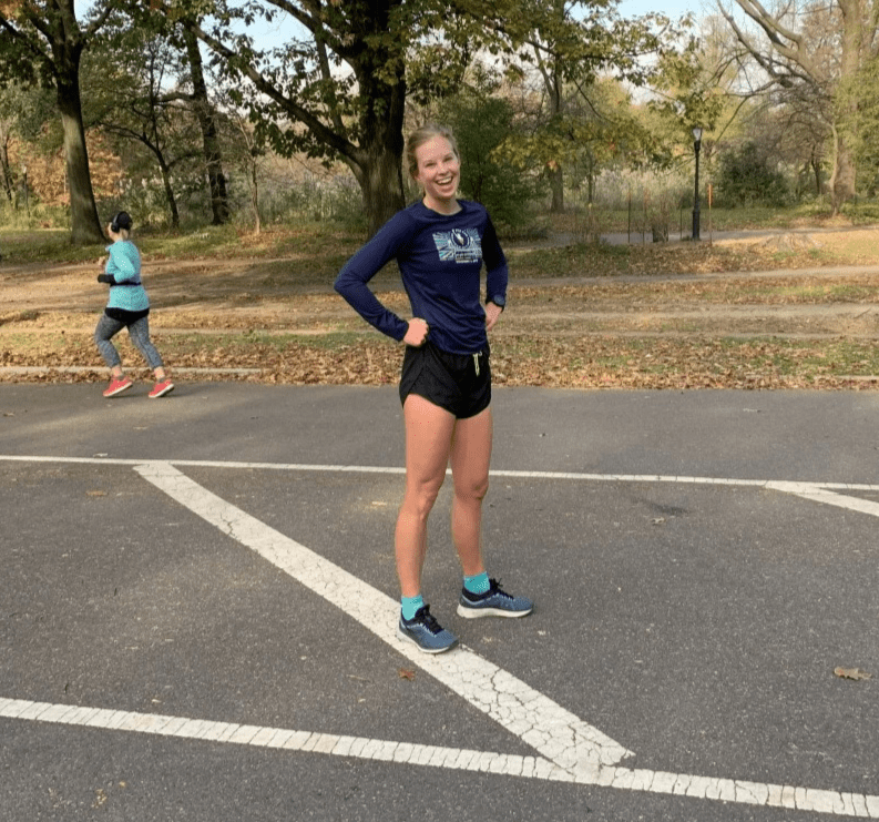 A New York runner poses for a photo after a running session in Central Park, New York A New York runner poses for a photo after a running session in Central Park, New York