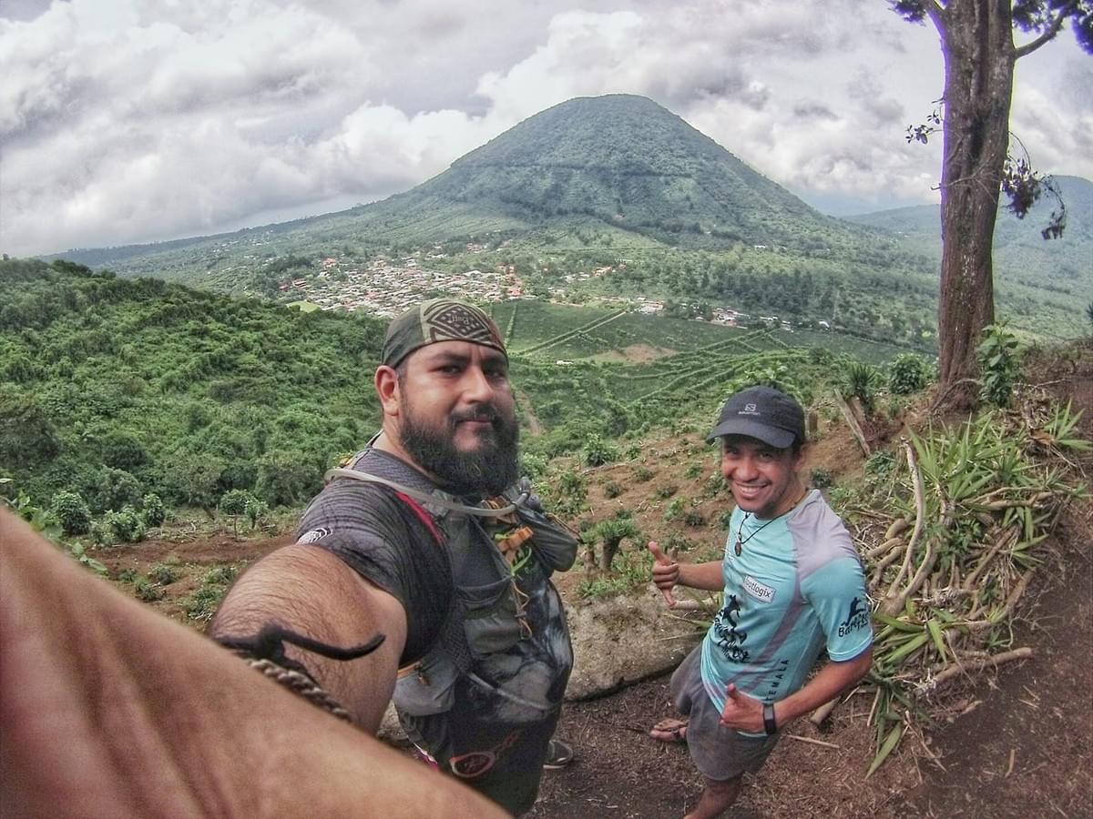 Two trail runners pause for a photo during a trail running marathon in El Salvador Two trail runners pause for a photo during a trail running marathon in El Salvador