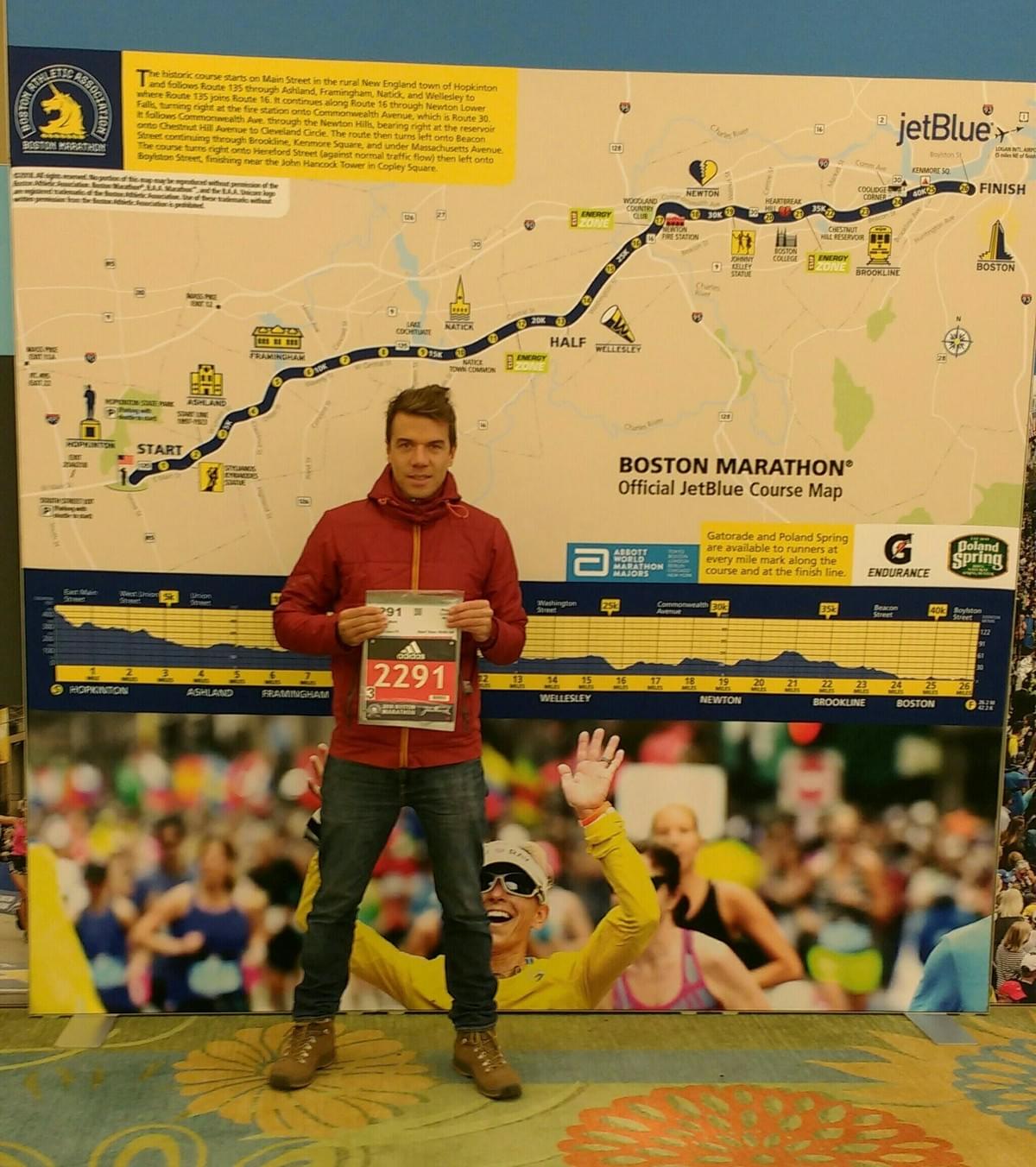 Race number photo in front of 2018 Boston Marathon course map Race number photo in front of 2018 Boston Marathon course map