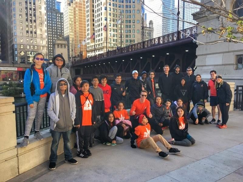 Group photo of participants on a Chicago Run Architecture Run at Chicago riverside Group photo of participants on a Chicago Run Architecture Run at Chicago riverside