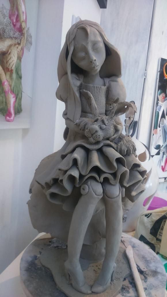 Girl with rabbit. White earthenware, 16 inches tall (before being fired)) Girl with rabbit. White earthenware, 16 inches tall (before being fired))