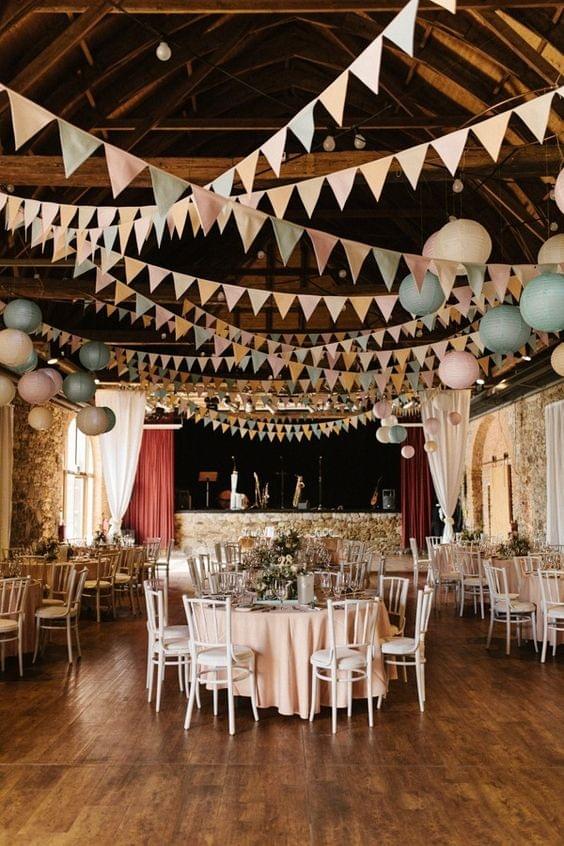 June Bug Weddings - Barn with bunting June Bug Weddings - Barn with bunting