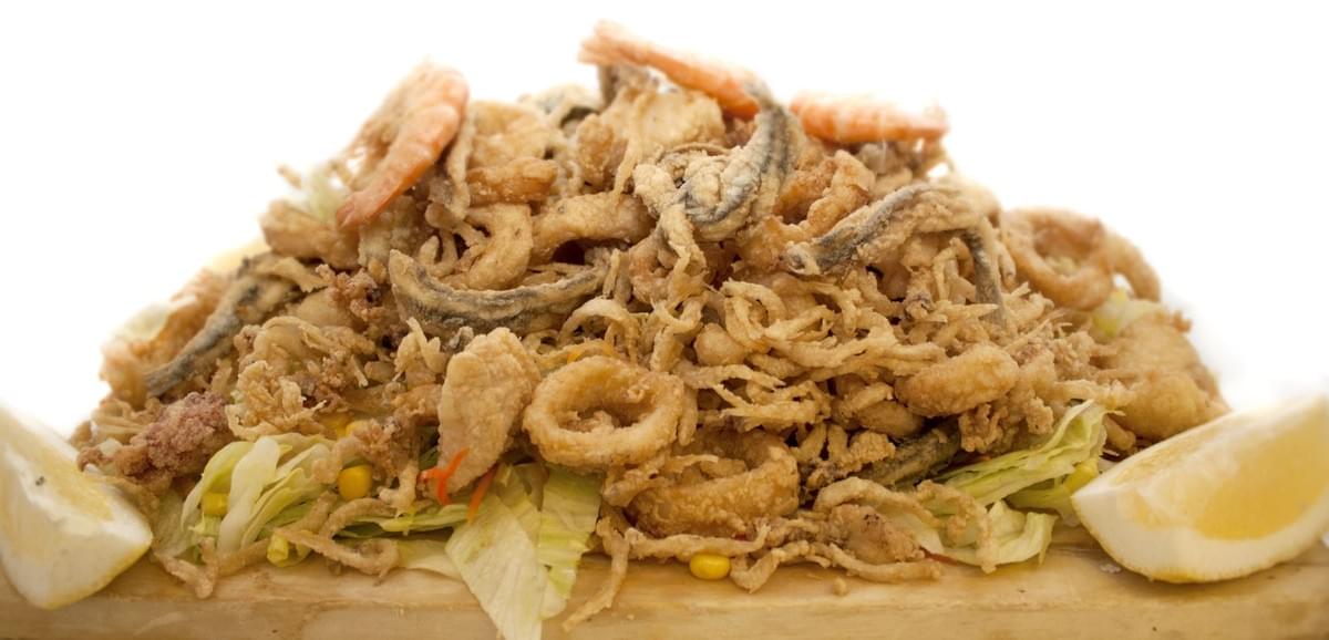 Fritura Malagueña - dish you cannot miss in Malaga - fried sea food Fritura Malagueña - dish you cannot miss in Malaga - fried sea food