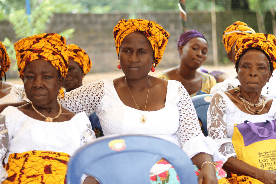Colorful women's empowerment gathering celebrating sisterhood and community