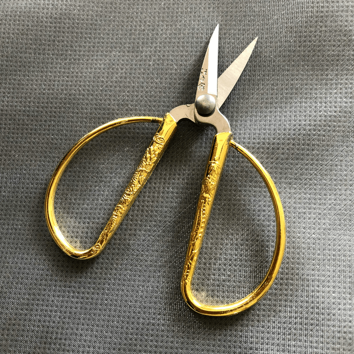 We use the latest technologies and the best materials to ensure accuracy in manufacturing and a luxurious final product that lasts a long time. Our expertise guarantees the delivery of products that meet the highest quality standards. High quality manufacturing Features list Create a professional and luxurious website for Wool Scissors factory in the Kingdom of Saudi Arabia, specialized in designing and manufacturing all types of clothing and uniforms with embroidery and printing services and visual identity design for clothing. The site should reflect quality, trust, and precision in manufacturing, with a simple modern and elegant design focusing on highlighting products and services. Use a sophisticated color palette consisting of Alexandrian black as the primary color, with dark green (#0A3A2F), medium green (#2E6B5A), gold (#CFA93A) for accent elements and call-to-action buttons, off-white (#F7F2E8) for backgrounds, and beige (#C7B7A1) for secondary elements. The site should include a distinguished homepage, About Us, Our Services, Portfolio, Products, Work Stages, Why Us, Customer Opinions, FAQ, and Contact with a form to request a quote. Use high-quality images, simple icons, and sufficient white space to showcase the factory's identity luxuriously, with full compatibility with phones and computers and high loading speed.