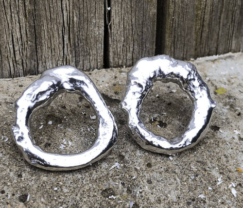 Molten solid silver organic form earrings