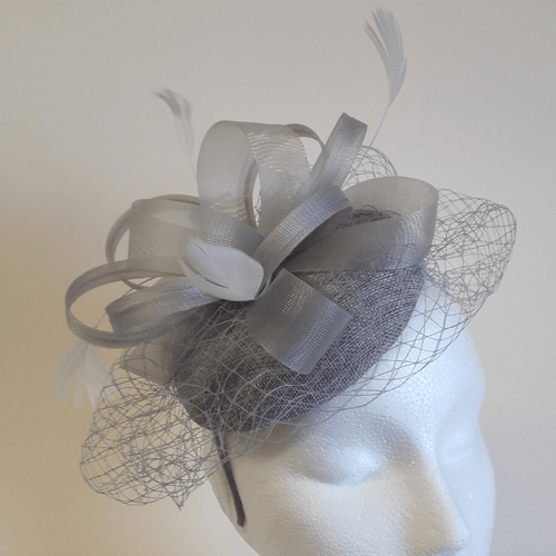 17 Silver cap headpiece with bow & net