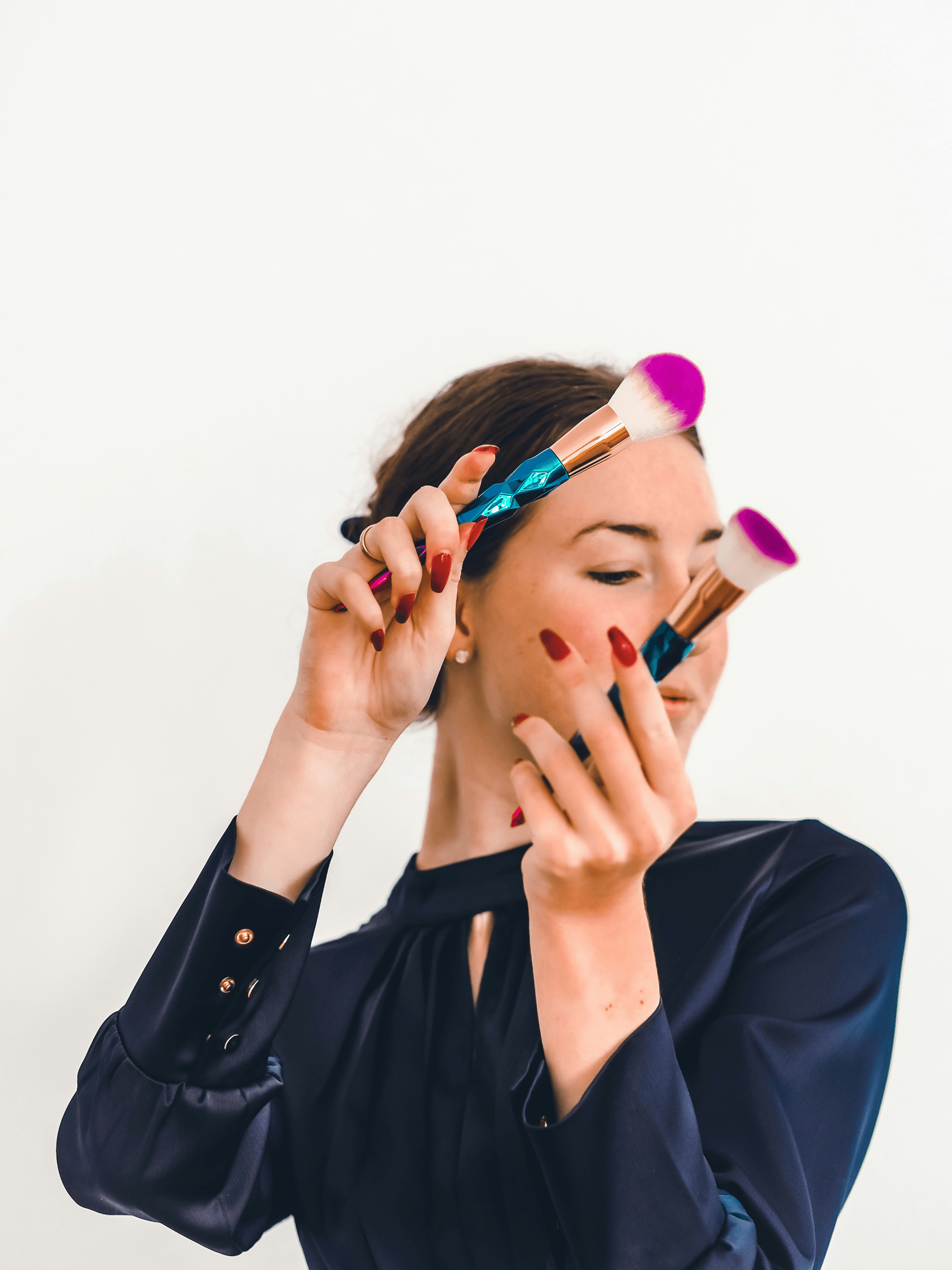 Woman comparing makeup colors during a personal image consultation