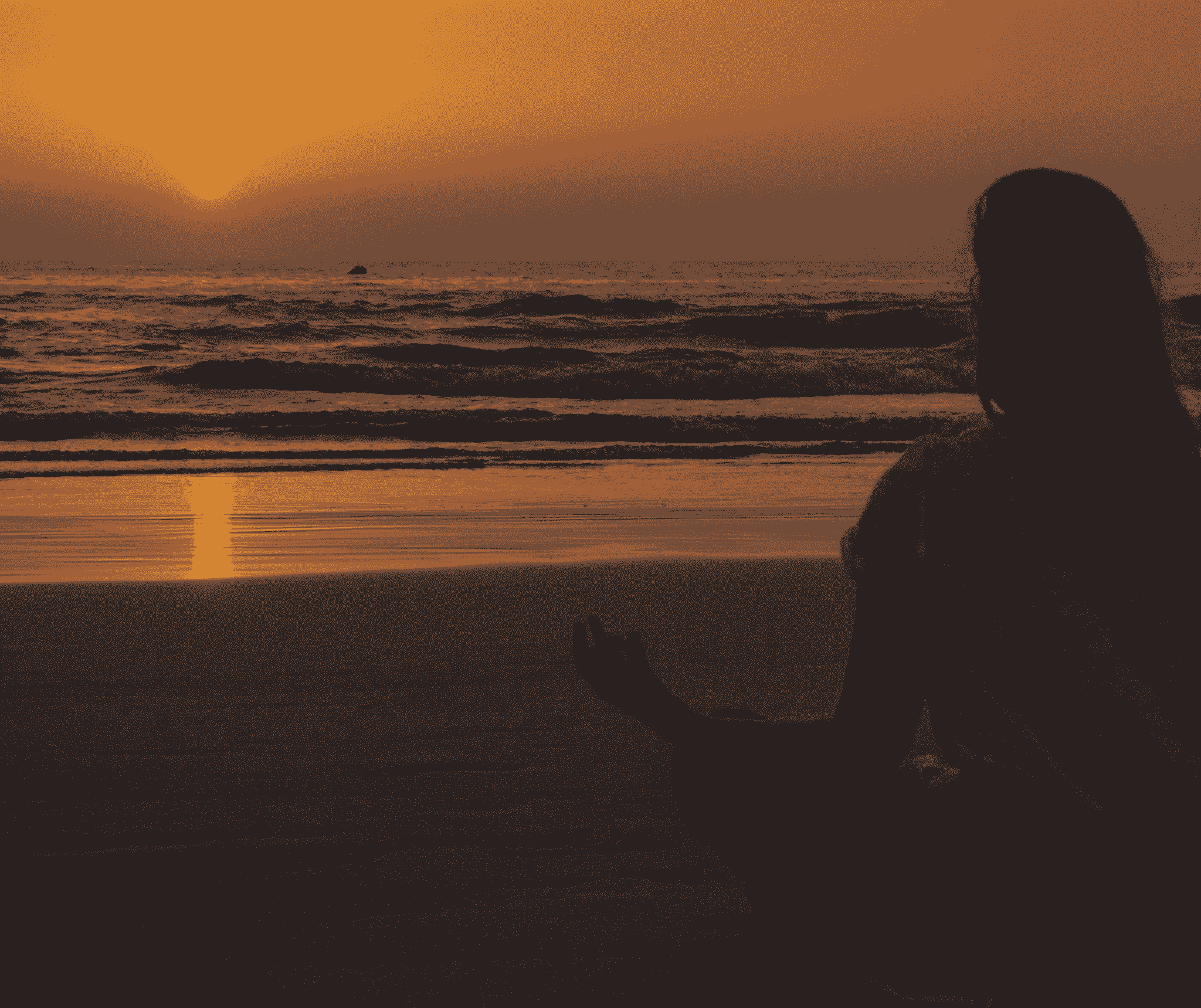 Experience peaceful yoga sessions on resort's beach during sunset