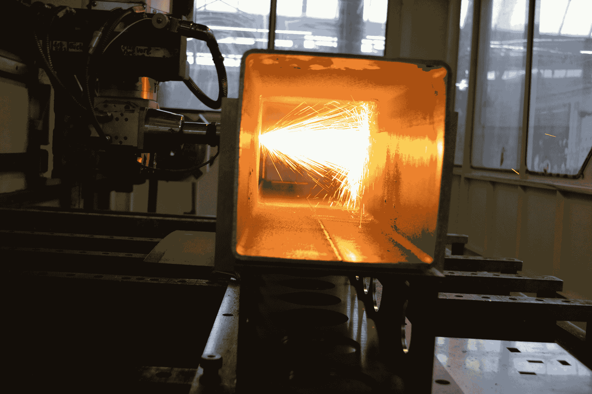 tube laser cutting machine performing precise cuts on steel tubes.