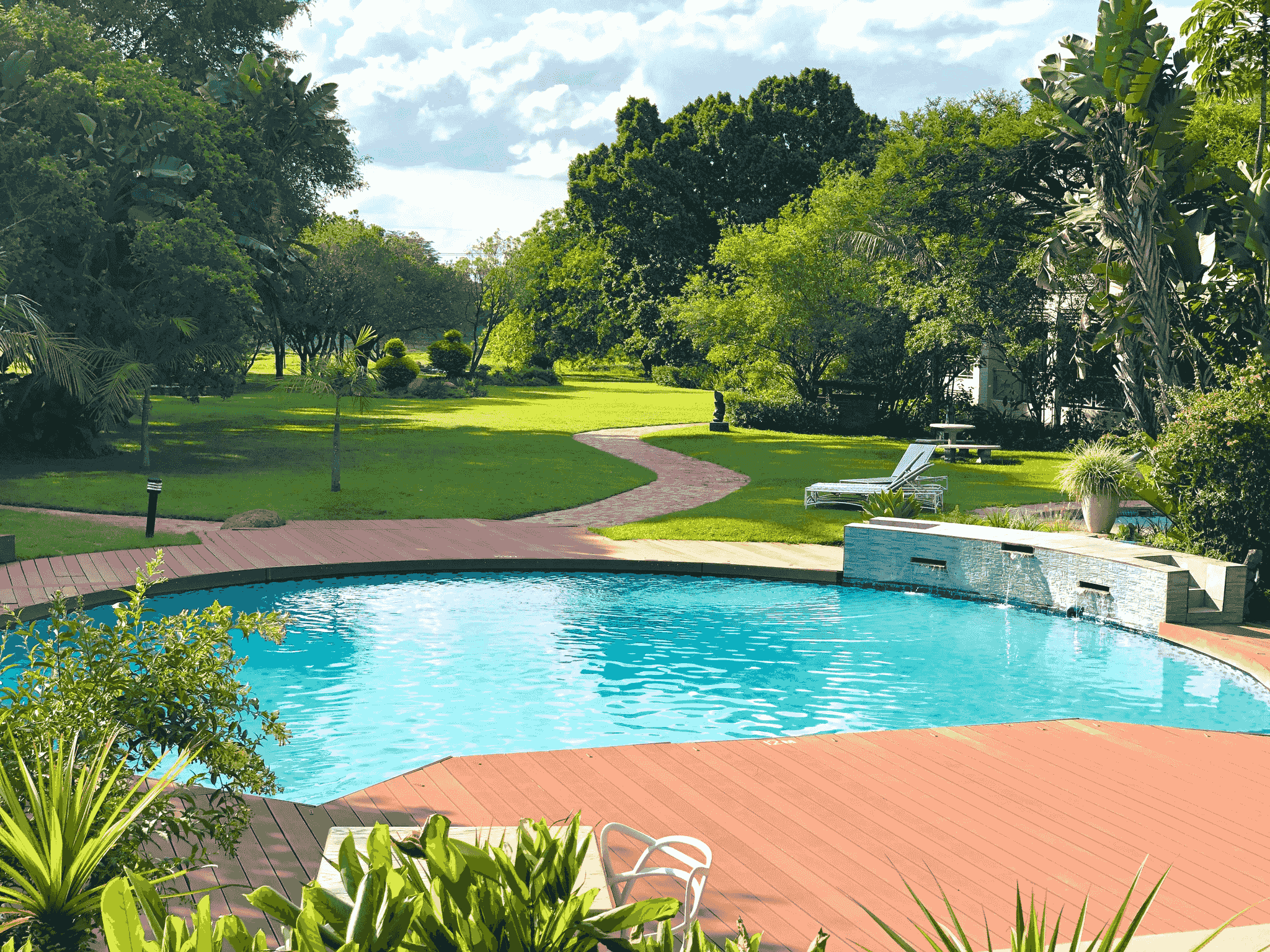 Timber pool fencing enhancing safety and style around swimming area