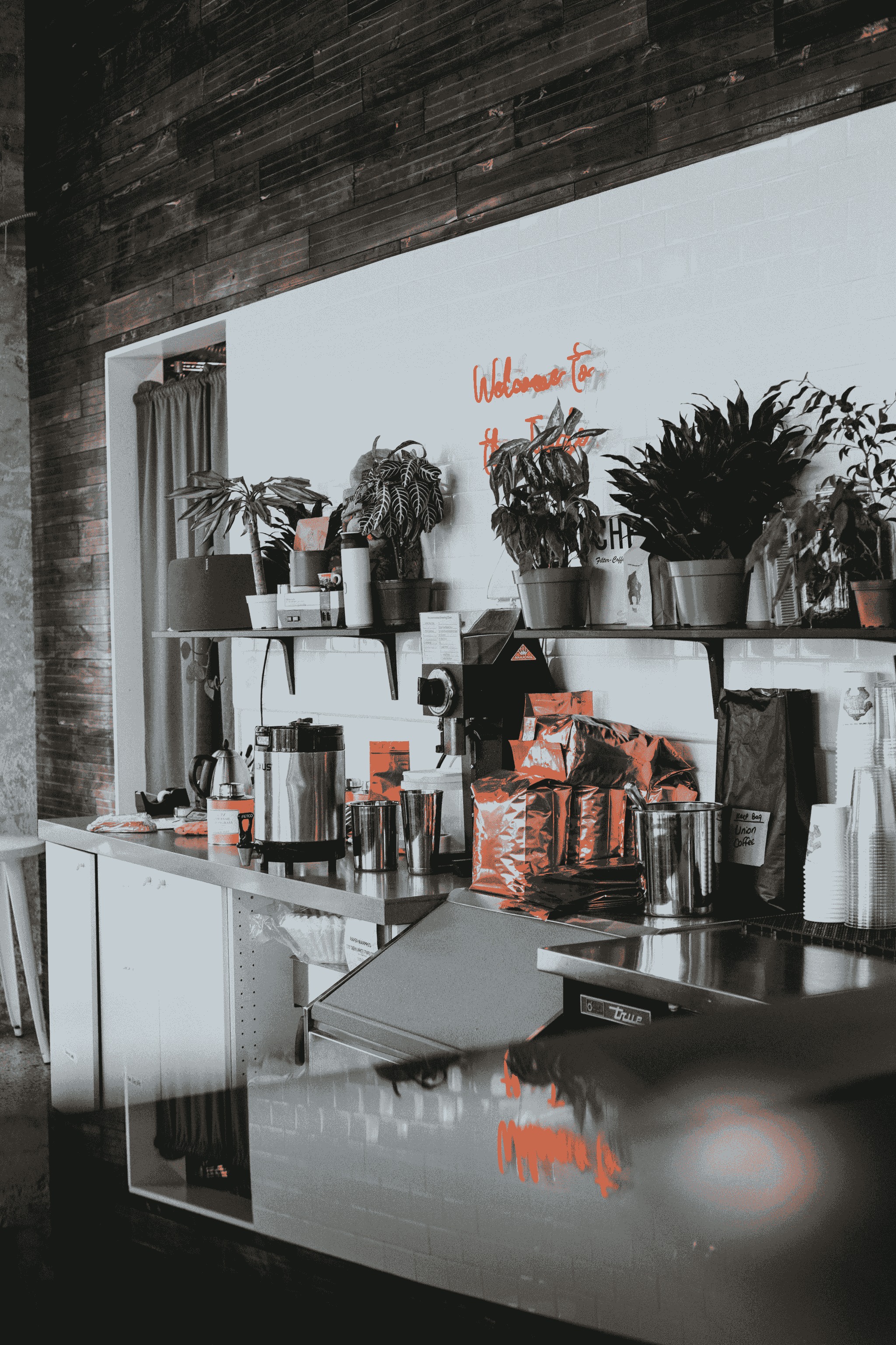 Innovative small container coffee shop design incorporating technology.