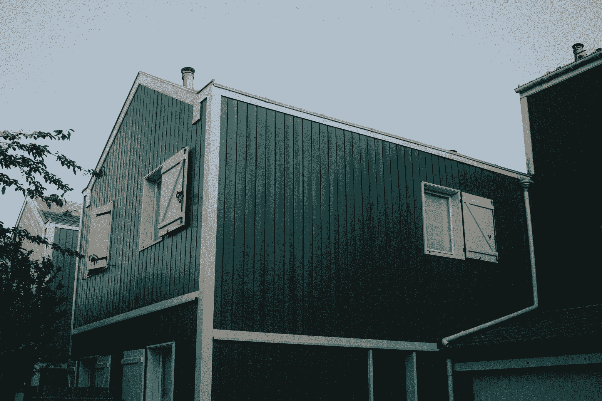 Beautiful modern home showcasing durable external cladding panels.