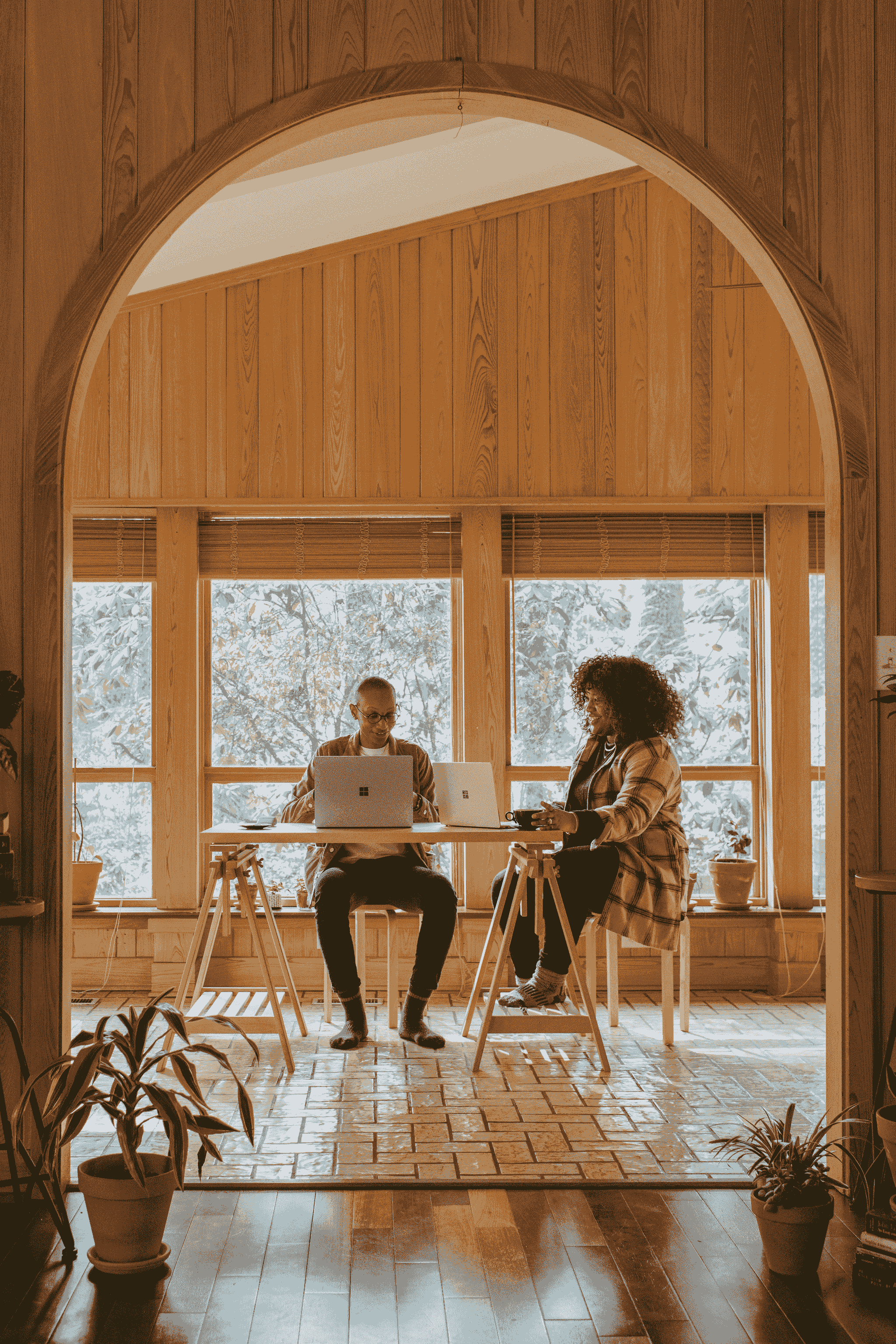 cabin office design featuring natural light and greenery