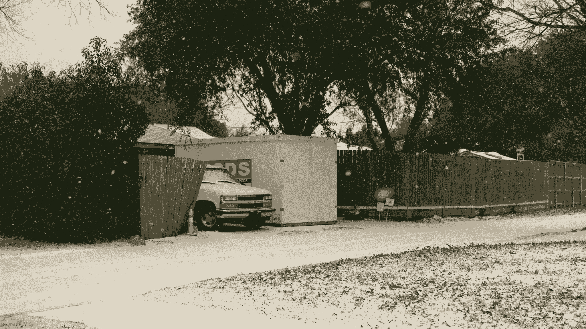 Moving truck parked outside a mobile homes park for sale