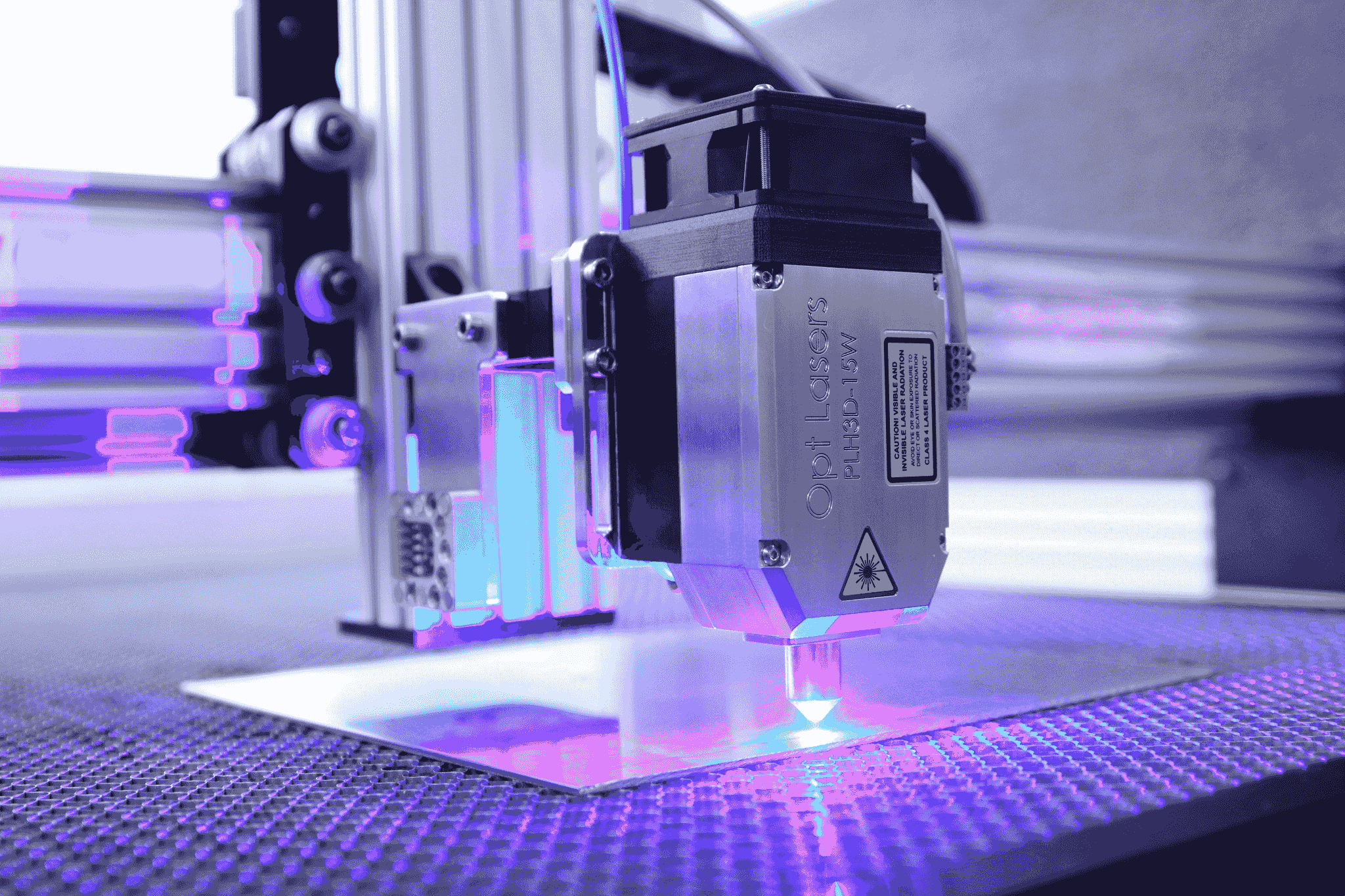desktop laser cutting machine creating intricate designs
