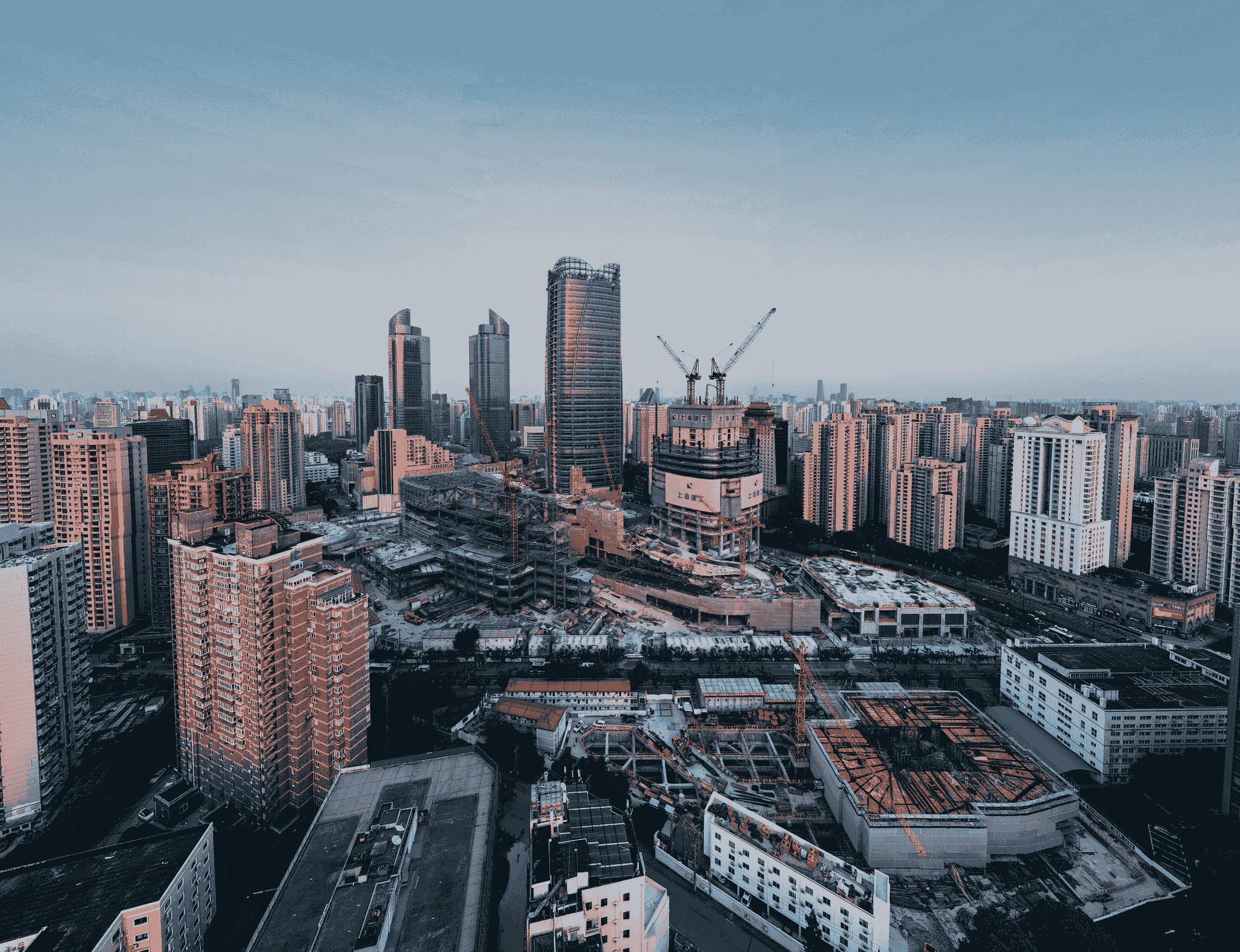 chinese prefab homes being rapidly assembled in an urban setting