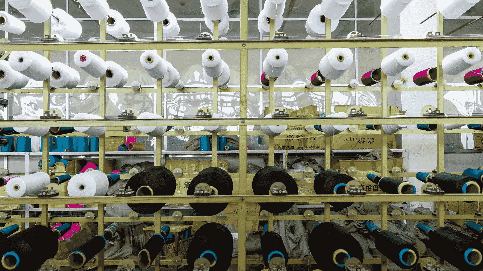 Sourcing clothing and textiles from China factories - Fabric inspection at a Chinese factory
