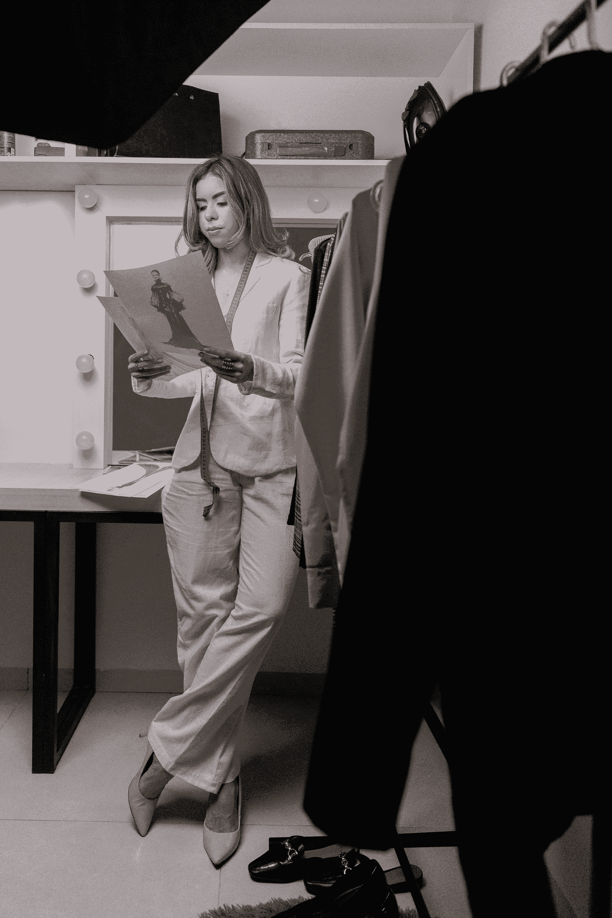 how to source clothing - designer working on a clothing prototype