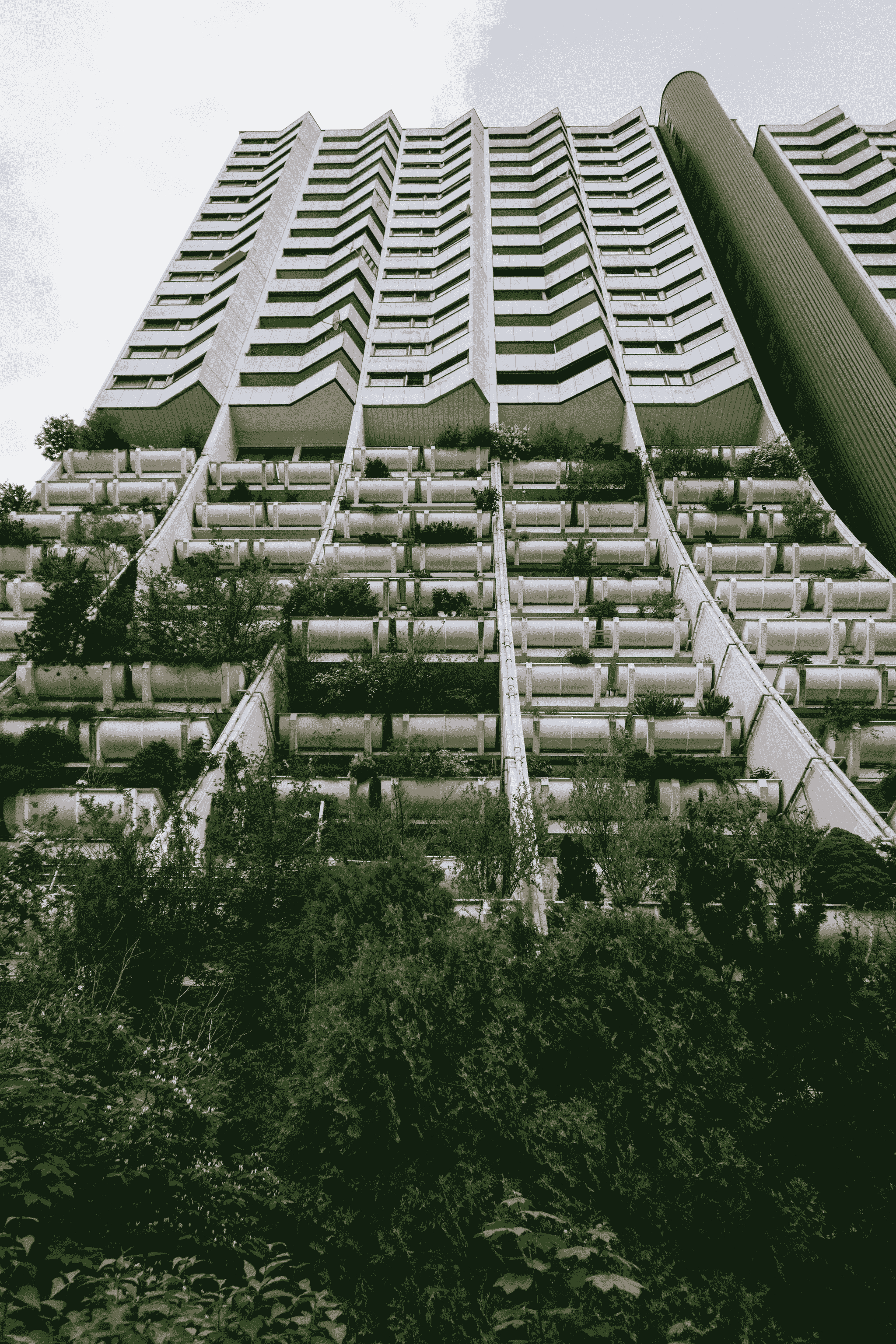 Innovative architecture featuring unique modular apartment building designs and integration of green spaces.