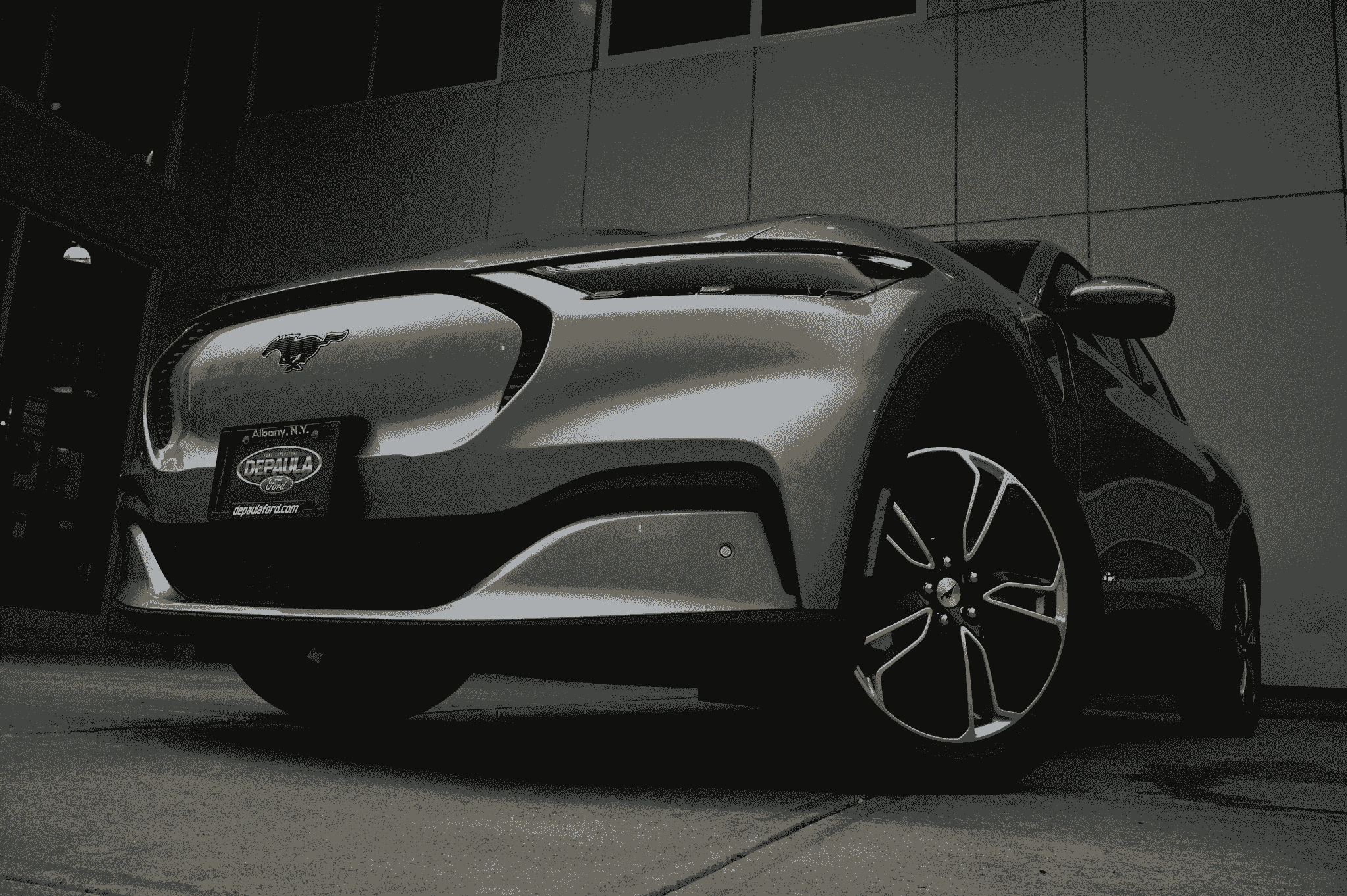 manufacturers of electric cars - Mustang Mach-E at charging station