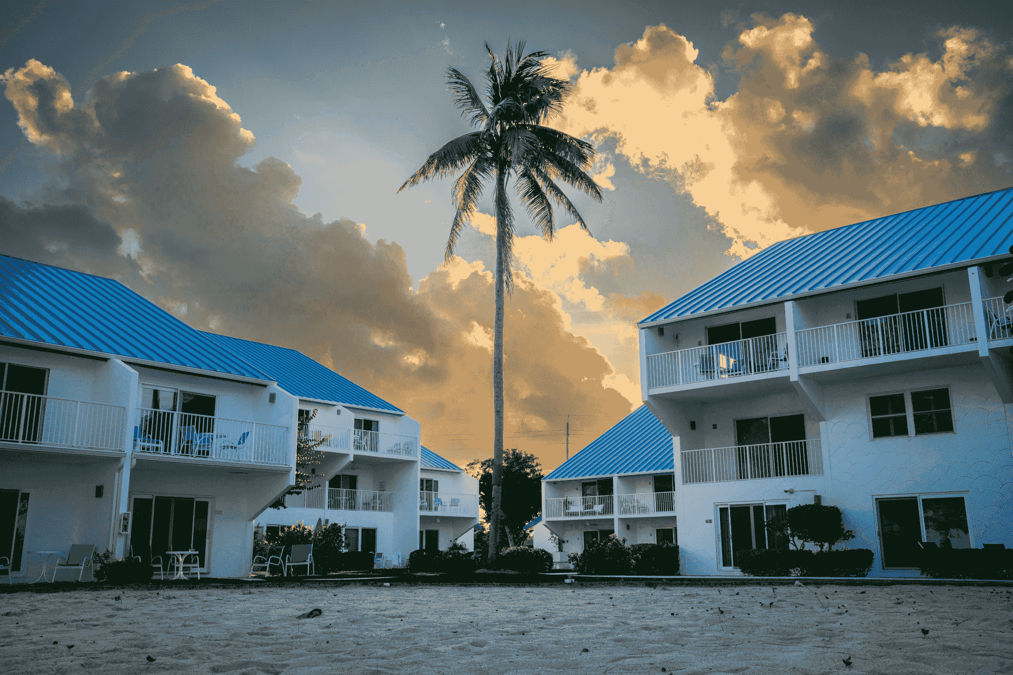 Sunset over beach resort rentals