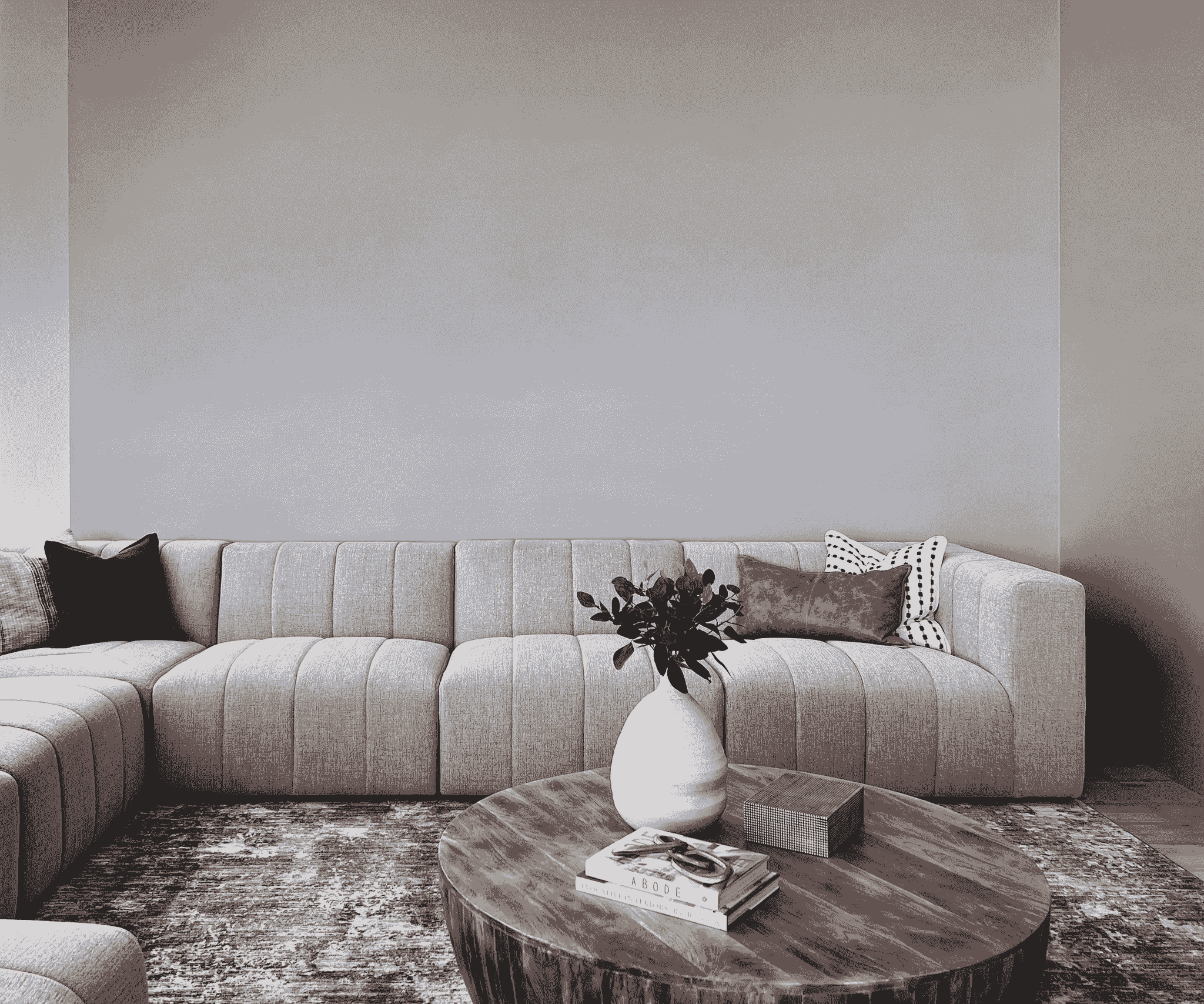 Luxury modern sofa in well-lit living room.