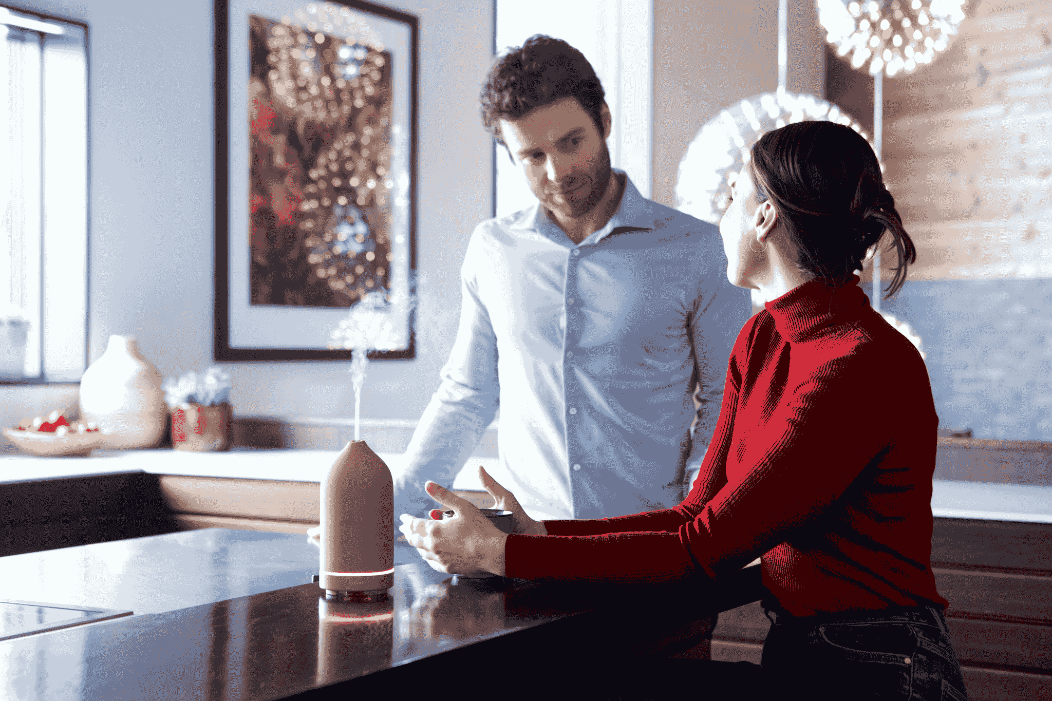 Hotel manager comparing prices of different hotel equipment supplies