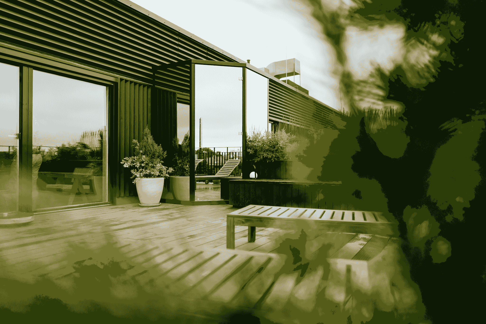 Outdoor deck attached to modern prefab structure