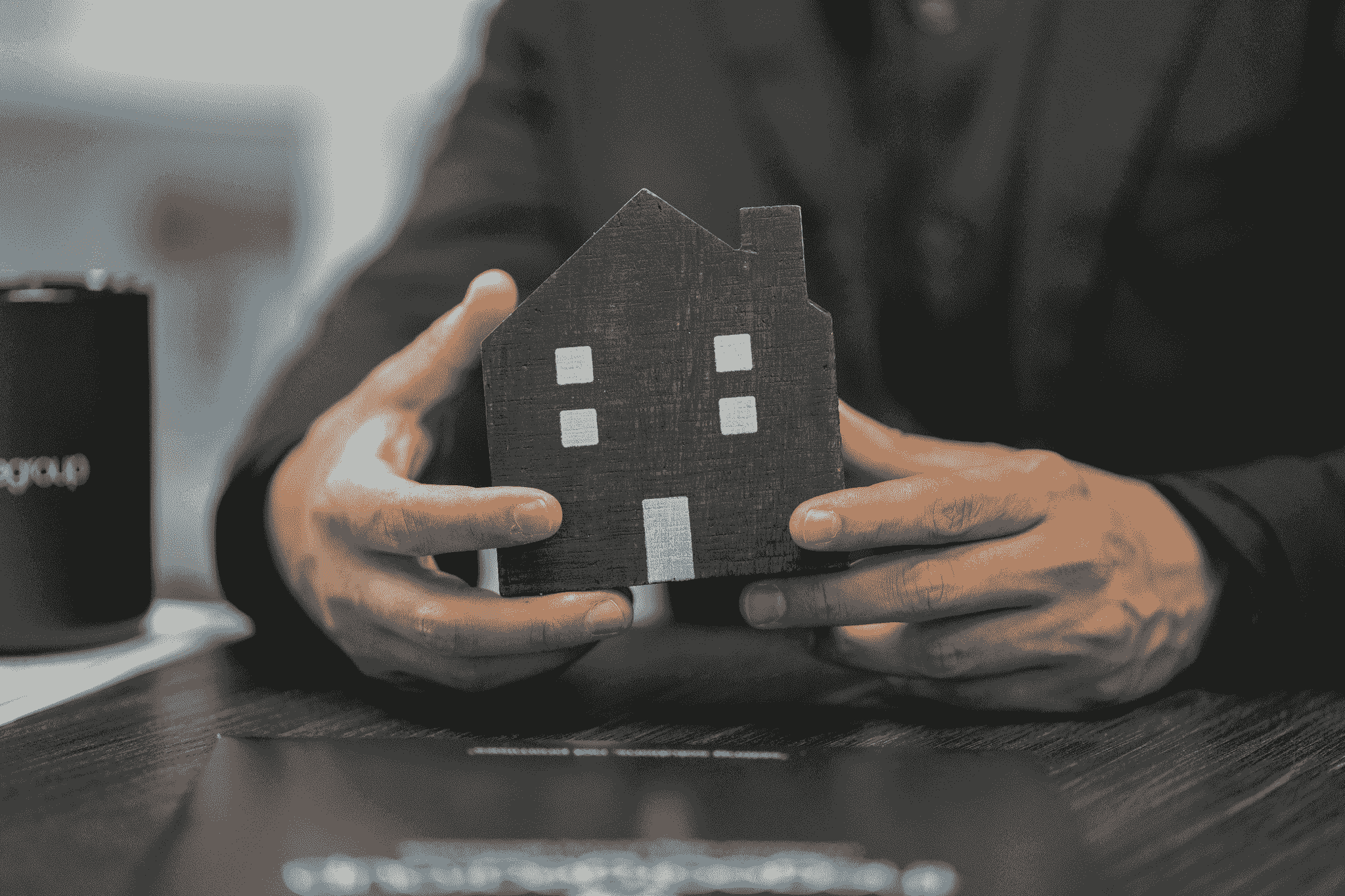 Architect showcasing model of prefabricated manufactured homes