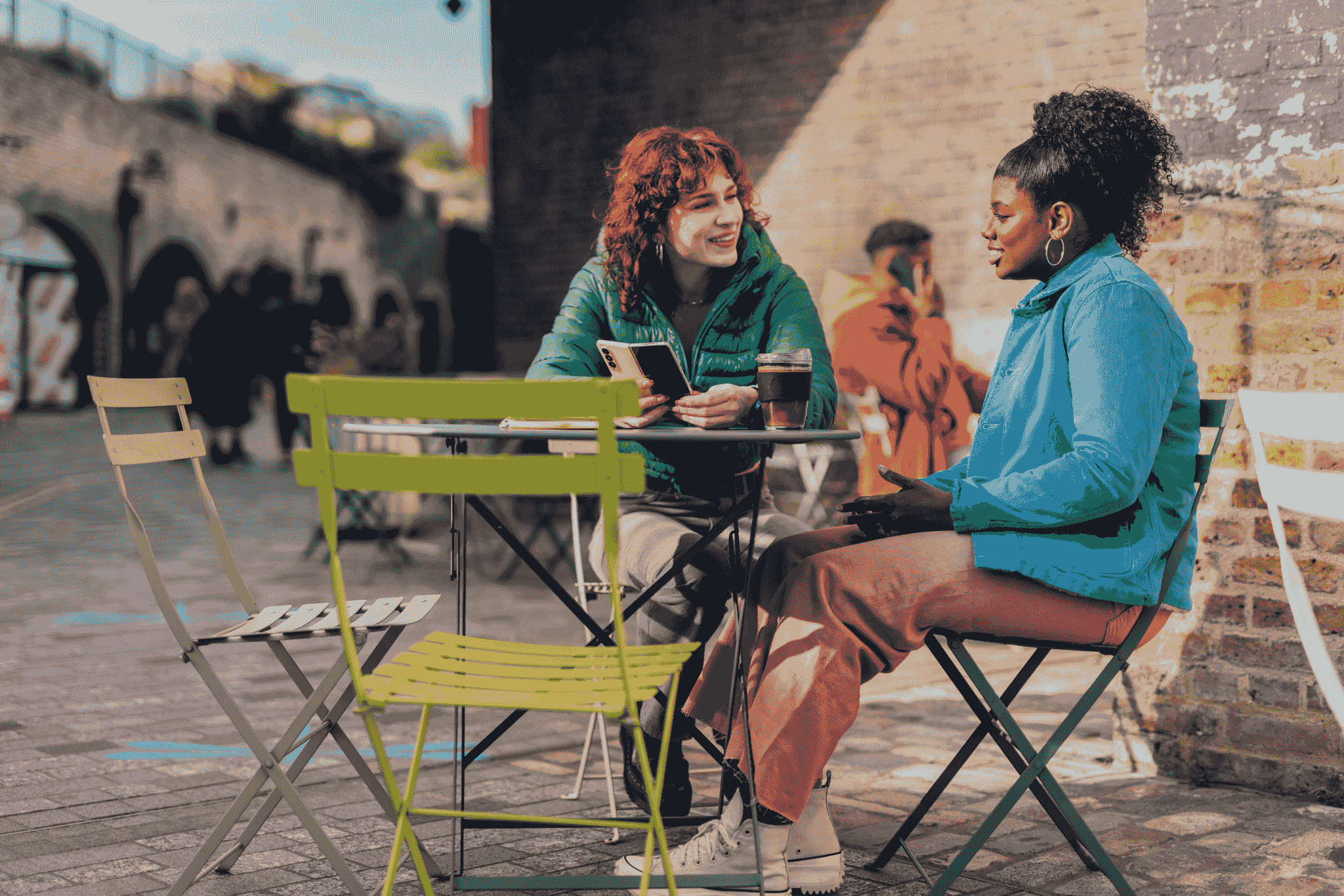 Discussing outdoor furniture designs with Chinese suppliers