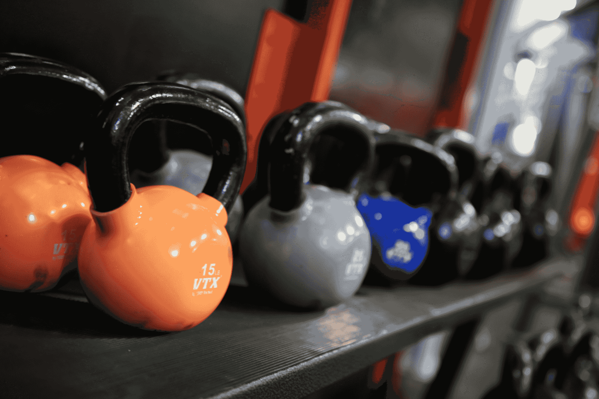 high-quality wholesale fitness products displayed in a vibrant gym setting